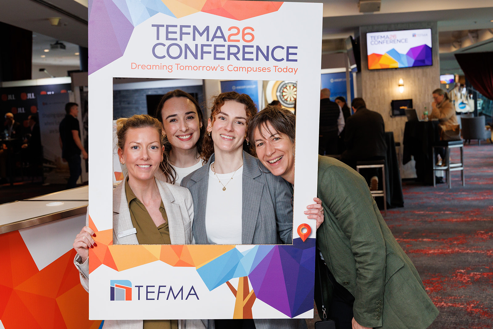Delegates having fun with a photo frame at the TEFMA26 Conference